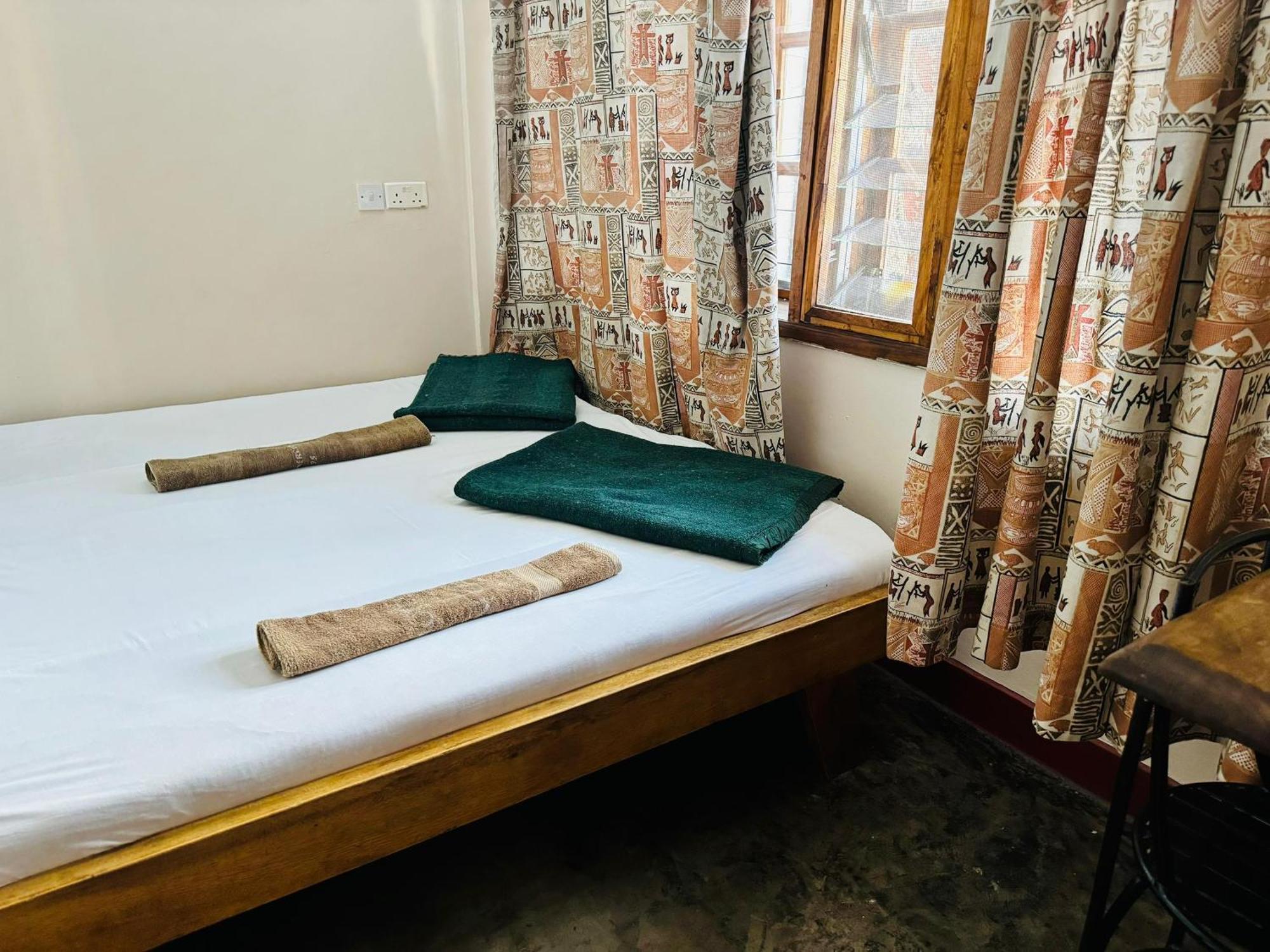 Arusha Backpackers Hotel Buitenkant foto